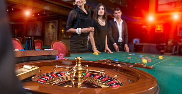 Group of young people playing roulette