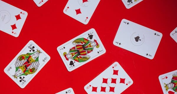 free-photo-of-photograph-of-playing-cards-on-a-red-surface
