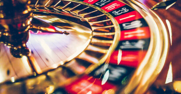 Spinning professional roulette wheel in casino. Property released.